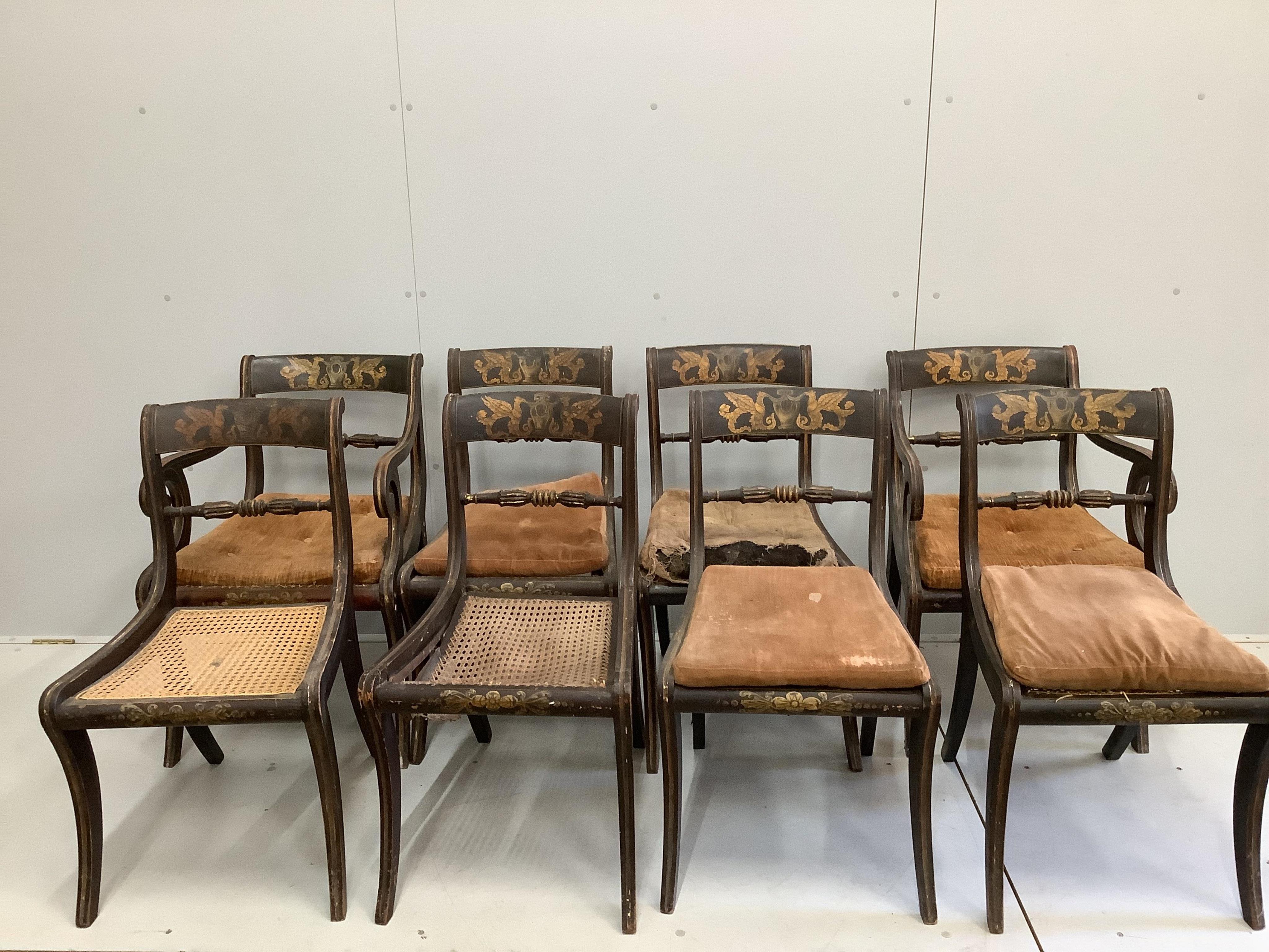 A set of eight Regency painted cane seat dining chairs, two with arms (in need of restoration)